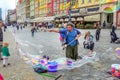 Ã¢â¬â street entertainer Ã¢â¬â playing with children, making soap bubbles